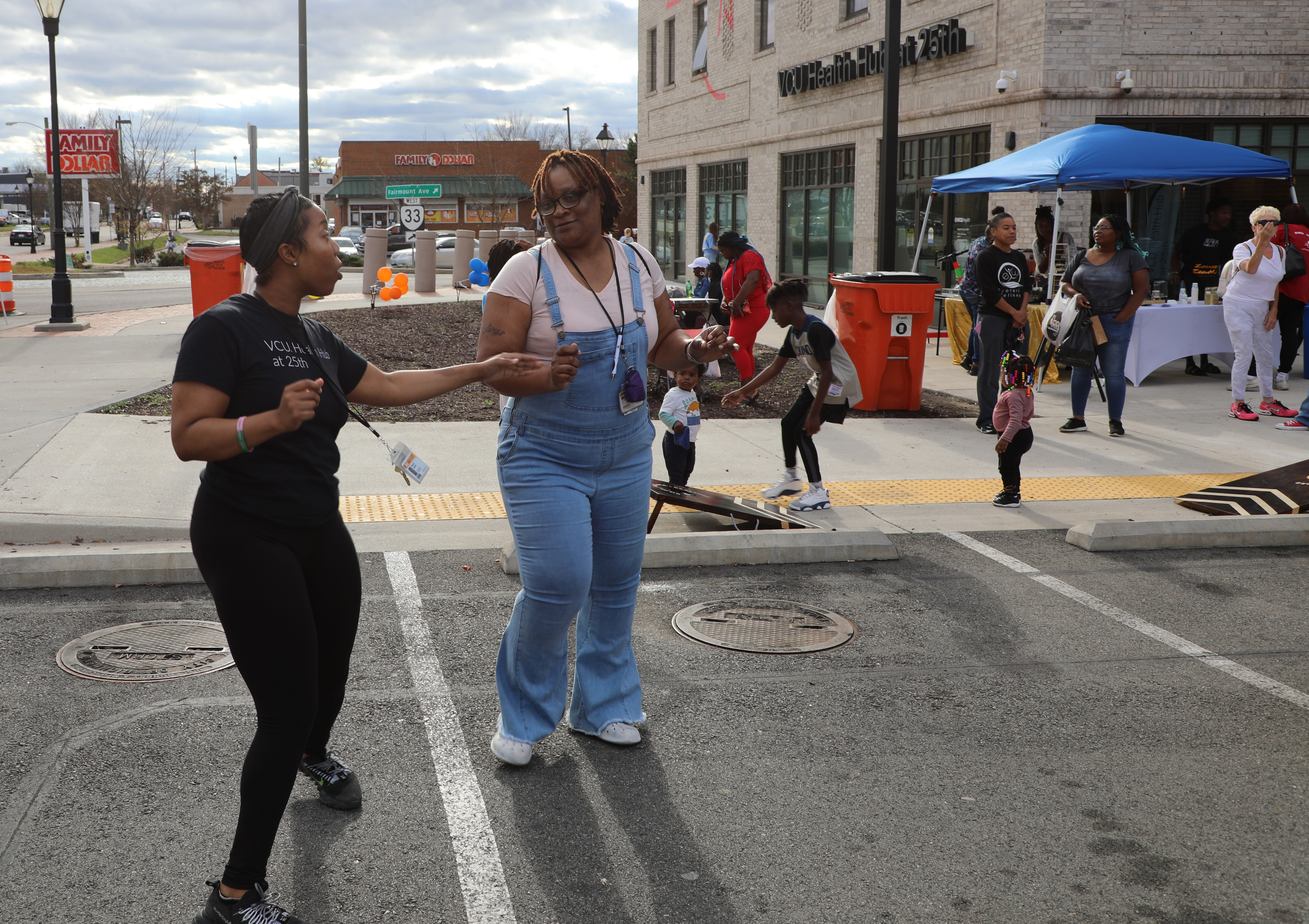 dancing in front of the health hub